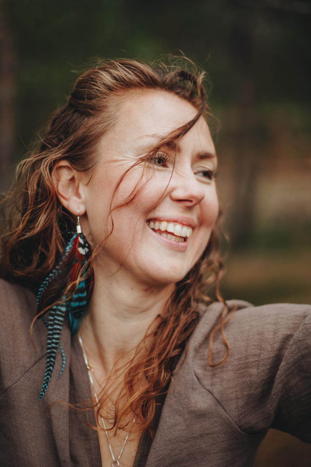 Lina, licensed naprapath and energy healer at Soulrise Studio